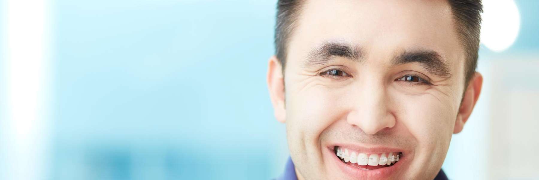 Young man smiling with braces, Roseville NSW